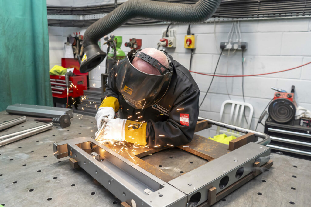 Photo of a welder at work at Kingsward Group