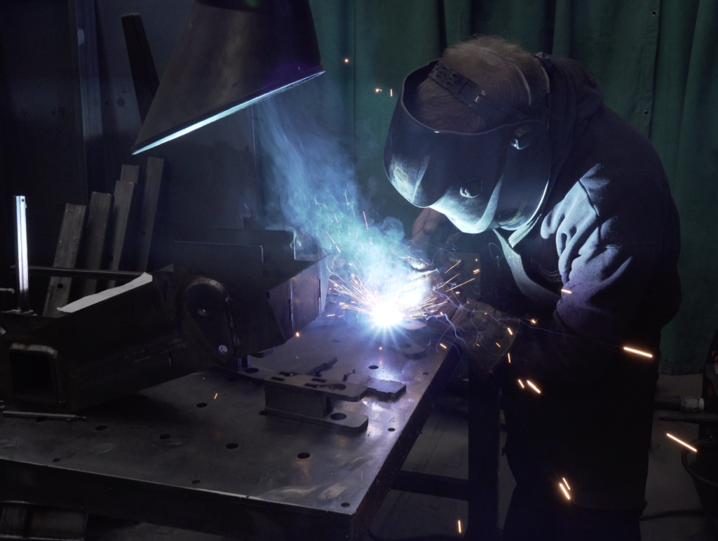 Photo of a welder at work at Kingsward Group